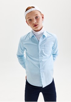 camisa de manga larga para niño color azul claro