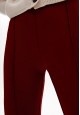Pantalones de punto color rojo oscuro